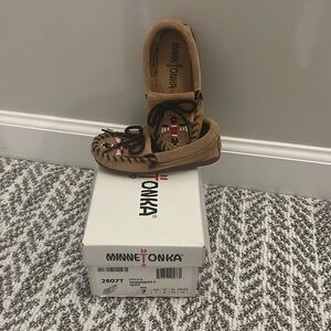 Never worn, Child’s thunderbird II taupe size 7